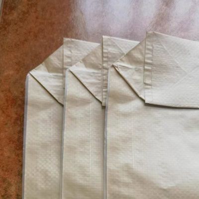 50x64x11cm 85GSM ((65GSM+20GSM) सीमेंट निर्माण सामग्री भरने के लिए प्लास्टिक पैकेजिंग बैग