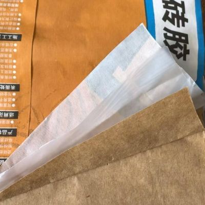 कस्टम सतह मुद्रण 2 प्लाई 80GSM पेपर सीमेंट बैग 1 प्लाई फिल्म मल्टी वॉल पेपर 20KG टाइल के लिए नमी का सबूत चिपकने वाला लंबे समय तक चलने वाला